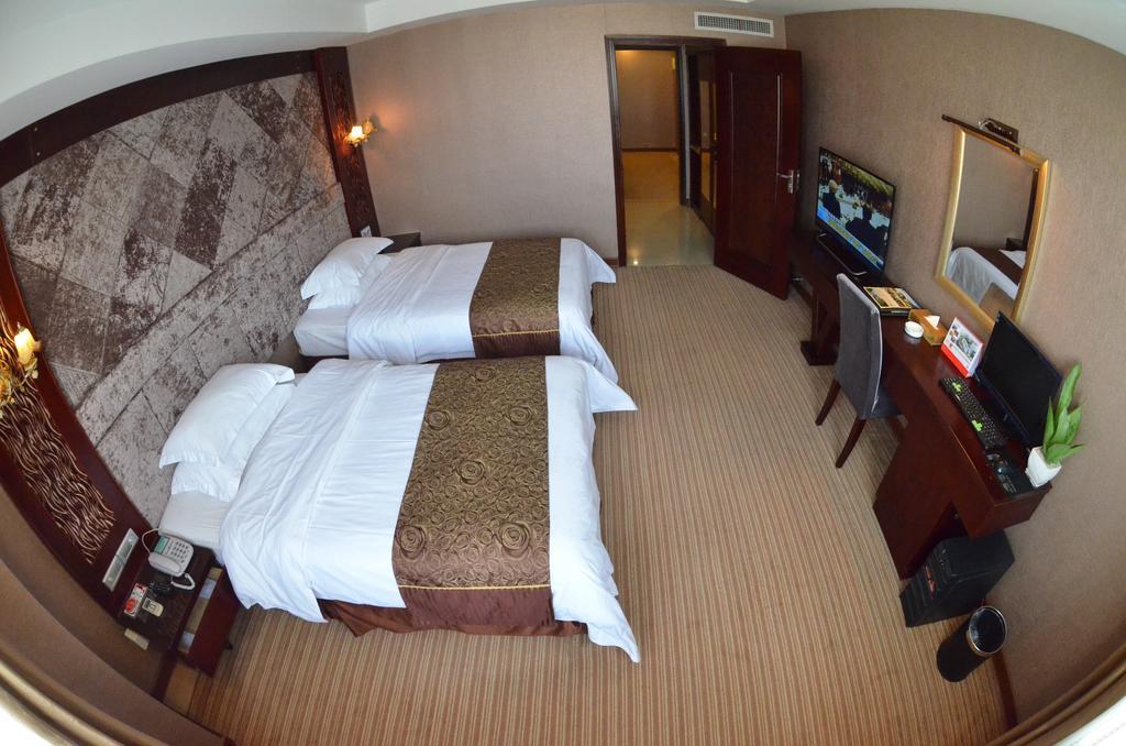 Xiamen Wanjia Oriental Hotel Oda fotoğraf